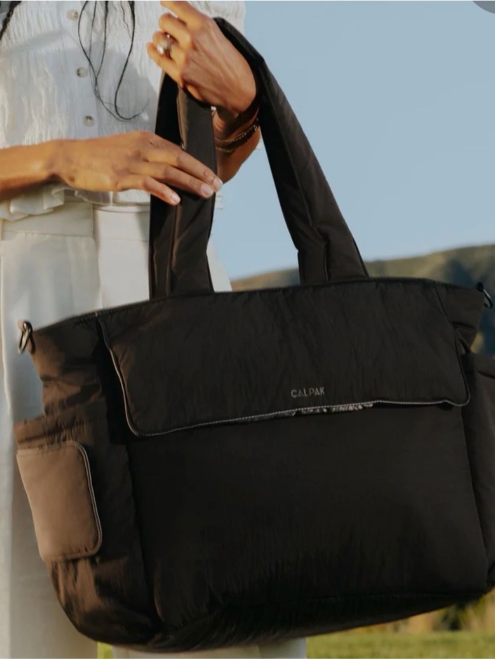 Calpak travel baby diaper Tote bag w/Laptop & luggage sleeve MSRP $200